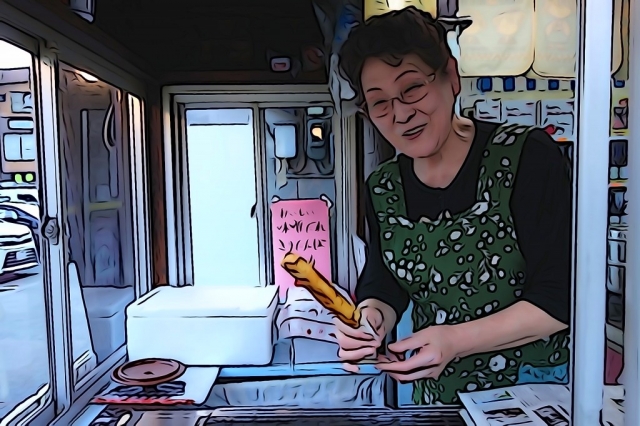 きりたんぽを渡す店員